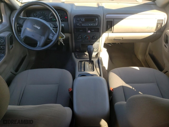 2004 Jeep Grand Cherokee Laredo with VIN 1J4GX48N14C435481, listed as a Copart auction lot 87855975 with 176,273 mi miles and Salvage Title. Bid and sale history available at carsss.com. Image 8.