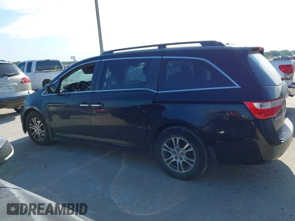 2012 Honda Odyssey EX-L z VIN 5FNRL5H63CB046447, wystawiony jako IAAI lot #42578775 z przebiegiem 247 852 mil mil oraz . Historia ofert i sprzedaży dostępna na DreamBid. Obrazek 14.
