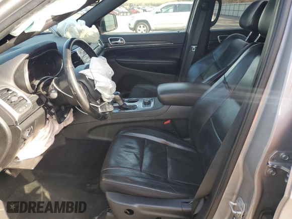 2021 Jeep Grand Cherokee 80th Anniversary with VIN 1C4RJFBG7MC665757, listed as a Copart auction lot 52443235 with 99,828 mi miles and Salvage Title. Bid and sale history available at DreamBid. Image 7.