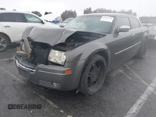 2010 Chrysler 300 Touring with VIN 2C3CA5CV2AH125842, listed as a IAAI auction lot 41804591 with 241,216 mi miles. Bid and sale history available at carsss.com. Image 2.