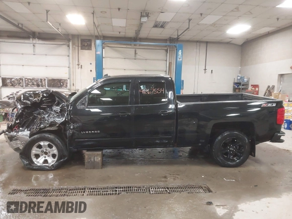 2015 Chevrolet Silverado 1500 LT with VIN 1GCVKREC2FZ417244, listed as a IAAI auction lot 41267554 with 87,735 mi miles and . Bid and sale history available at DreamBid. Image 14.