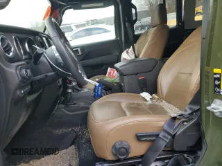 2023 Jeep Wrangler Sahara with VIN 1C4JJXP62PW553101, listed as a Copart auction lot 85543124 with 28,157 mi miles and Salvage Title. Bid and sale history available at DreamBid. Image 7.