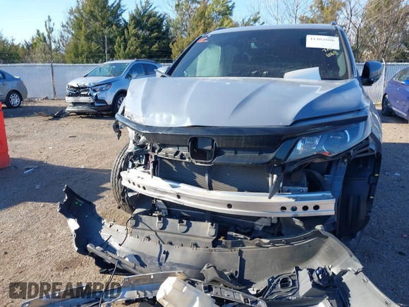2022 Honda Pilot Special Edition with VIN 5FNYF5H21NB026068, listed as a IAAI auction lot 41482606 with 46,947 mi miles and . Bid and sale history available at carsss.com. Image 12.