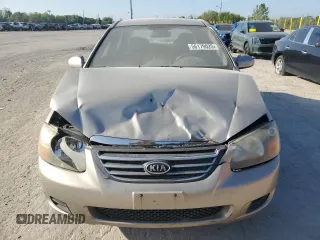 2009 Kia Spectra LX z VIN KNAFE222995618257, wystawiony jako Copart lot #56179025 z przebiegiem 270 087 mil mil oraz Szkoda całkowita • Salvage title. Historia ofert i sprzedaży dostępna na DreamBid. Obrazek 5.