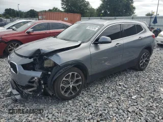 2023 BMW X2 sDrive28i z VIN WBXYH9C09P5V32052, wystawiony jako Copart lot #59529295 z przebiegiem 45 521 mil mil oraz Czysty tytuł • Clean title. Historia ofert i sprzedaży dostępna na DreamBid. Obrazek 1.
