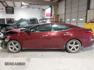 2016 Nissan Maxima SV z VIN 1N4AA6AP8GC431166, wystawiony jako IAAI lot #41973524 z przebiegiem 119 093 mil mil oraz . Historia ofert i sprzedaży dostępna na DreamBid. Obrazek 15.