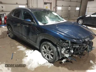 2023 Mazda CX-30 2.5 S Select Package with VIN 3MVDMBBM2PM583968, listed as a IAAI auction lot 41597520 with 32,077 mi miles. Bid and sale history available at carsss.com. Image 1.