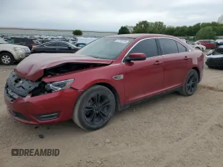 2015 Ford Taurus SEL with VIN 1FAHP2H84FG102122, listed as a Copart auction lot 57792735 with 139,288 mi miles and Clean title. Bid and sale history available at DreamBid. Image 1.