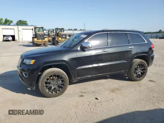 2015 Jeep Grand Cherokee Overland z VIN 1C4RJFCT6FC103217, wystawiony jako Copart lot #56667805 z przebiegiem 126 214 mil mil oraz Szkoda całkowita • Salvage title. Historia ofert i sprzedaży dostępna na DreamBid. Obrazek 1.