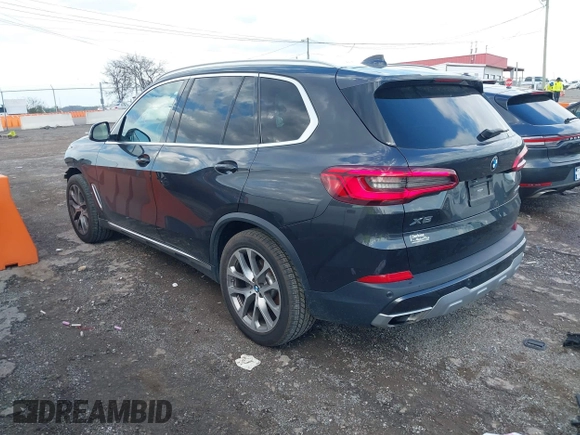 2020 BMW X5 xDrive40i with VIN 5UXCR6C08L9B56211, listed as a IAAI auction lot 41967486 with 51,973 mi miles. Bid and sale history available at carsss.com. Image 3.