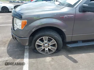 2014 Ford F-150 XL with VIN 1FTEX1CM4EKF42963, listed as a IAAI auction lot 42593646 with 143,409 mi miles and . Bid and sale history available at DreamBid. Image 6.
