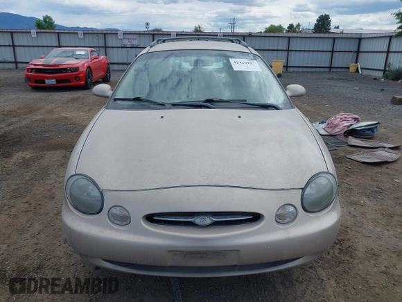 1998 Ford Taurus with VIN 1FAFP57U8WG275844, listed as a IAAI auction lot 42426107 with 318,654 mi miles and . Bid and sale history available at DreamBid. Image 12.