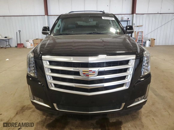 2015 Cadillac Escalade Luxury with VIN 1GYS4MKJ2FR737743, listed as a Copart auction lot 56935494 with 98,300 mi miles and Salvage Title. Bid and sale history available at carsss.com. Image 5.