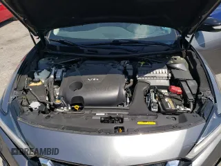 2019 Nissan Maxima SV с VIN 1N4AA6AV5KC370737, выставлен на аукционе Copart как лот 52680165 с пробегом 51 785 миль миль и Списание • Salvage title. История ставок и продаж доступна на DreamBid. Изображение 12.
