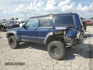 1997 Jeep Cherokee with VIN 1J4FN78S6VL604971, listed as a Copart auction lot 70690304 with 226,913 mi miles and Salvage title. Bid and sale history available at DreamBid. Image 2.