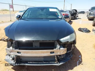 2017 Audi A4 Premium z VIN WAUGNAF41HN012041, wystawiony jako IAAI lot #42077042 z przebiegiem 145 856 mil mil oraz . Historia ofert i sprzedaży dostępna na DreamBid. Obrazek 13.