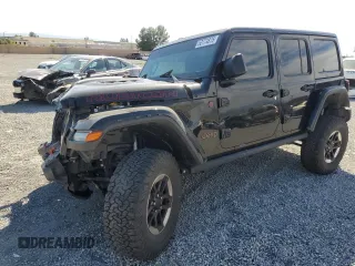 2020 Jeep Wrangler Unlimited Rubicon z VIN 1C4HJXFG1LW141335, wystawiony jako Copart lot #52774875 z przebiegiem 59 843 mil mil oraz Szkoda całkowita • Salvage title. Historia ofert i sprzedaży dostępna na DreamBid. Obrazek 1.