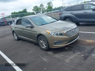 2015 Hyundai Sonata SE z VIN 5NPE24AF2FH241340, wystawiony jako IAAI lot #42426462 z przebiegiem 103 781 mil mil oraz . Historia ofert i sprzedaży dostępna na DreamBid. Obrazek 1.