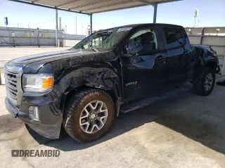 2021 GMC Canyon 4WD AT4 w/Cloth with VIN 1GTG6FEN0M1273816, listed as a Copart auction lot 65976804 with 28,082 mi miles and Salvage Title. Bid and sale history available at carsss.com. Image 1.
