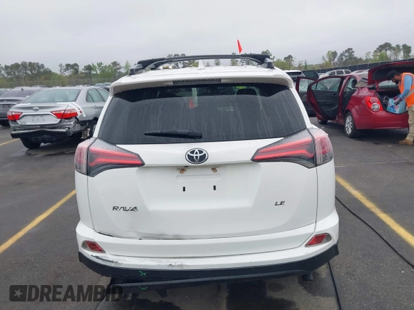 2017 Toyota RAV4 LE with VIN JTMZFREV9HJ704296, listed as a IAAI auction lot 41876996 with 85,605 mi miles and . Bid and sale history available at DreamBid. Image 16.