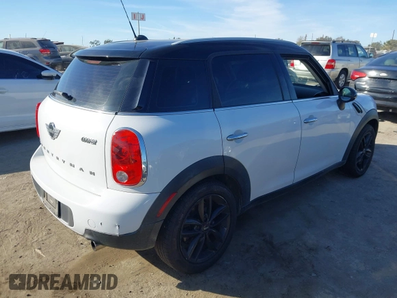 2014 MINI Countryman with VIN WMWZB3C59EWR40065, listed as a IAAI auction lot 40838816 with 80,000 mi miles and . Bid and sale history available at DreamBid. Image 4.