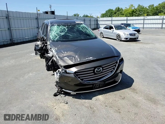 2018 Mazda CX-9 Grand Touring with VIN JM3TCADY5J0200052, listed as a Copart auction lot 55160715 with 68,464 mi miles and Salvage title. Bid and sale history available at DreamBid. Image 14.