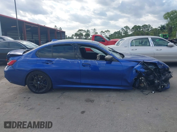 2020 BMW 3 Series M340i xDrive with VIN WBA5U9C00LA379345, listed as a IAAI auction lot 41256225 with 57,856 mi miles and . Bid and sale history available at DreamBid. Image 13.