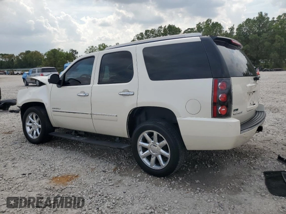 2011 GMC Yukon Denali with VIN 1GKS2EEF0BR378125, listed as a Copart auction lot 72920364 with 148,080 mi miles and Salvage Title. Bid and sale history available at carsss.com. Image 2.
