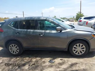 2017 Nissan Rogue S with VIN KNMAT2MT6HP610077, listed as a IAAI auction lot 42726053 with 236,304 mi miles and . Bid and sale history available at DreamBid. Image 13.
