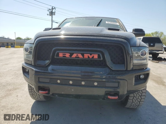 2016 Ram 1500 Rebel z VIN 1C6RR7YT1GS350439, wystawiony jako Copart lot #52300885 z przebiegiem 196 557 mil mil oraz Szkody całkowita. Historia ofert i sprzedaży dostępna na DreamBid. Obrazek 5.