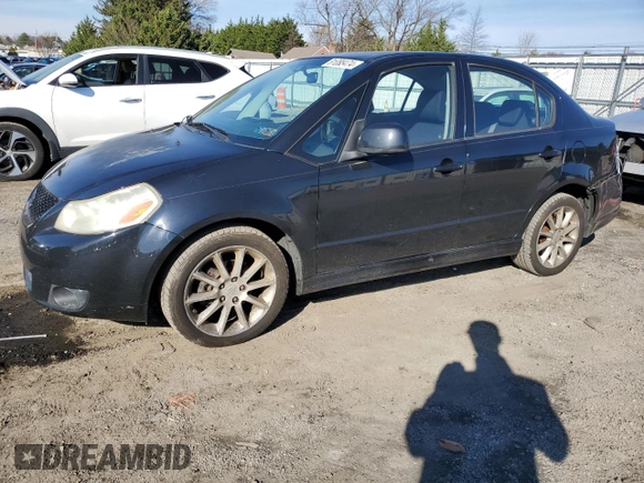 2008 Suzuki SX4 Sport z VIN JS2YC414485103087, wystawiony jako Copart lot #81088474 z przebiegiem 165 047 mil mil oraz Szkoda całkowita • Salvage title. Historia ofert i sprzedaży dostępna na DreamBid. Obrazek 1.