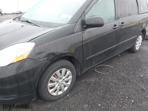 2010 Toyota Sienna CE with VIN 5TDKK4CC6AS343068, listed as a IAAI auction lot 41973330 with 327,086 mi miles. Bid and sale history available at carsss.com. Image 6.