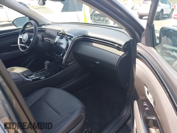 2022 Hyundai Tucson SEL z VIN 5NMJCCAE4NH096813, wystawiony jako IAAI lot #41899641 z przebiegiem 23 668 mil mil oraz . Historia ofert i sprzedaży dostępna na DreamBid. Obrazek 5.