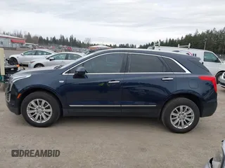 2017 Cadillac XT5 FWD with VIN 1GYKNARS2HZ188557, listed as a IAAI auction lot 41840764 with 104,524 mi miles. Bid and sale history available at carsss.com. Image 14.