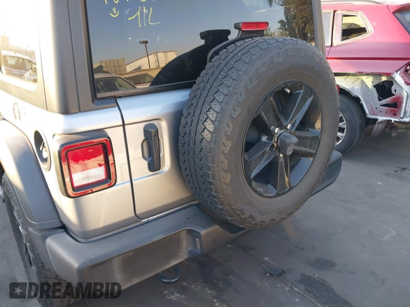 2021 Jeep Wrangler Unlimited Sport Altitude with VIN 1C4HJXDGXMW662493, listed as a IAAI auction lot 41288957 with 64,808 mi miles and . Bid and sale history available at DreamBid. Image 18.