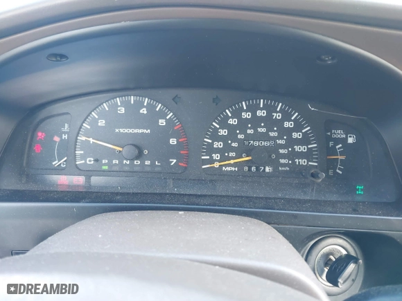 1998 Toyota 4Runner Limited with VIN JT3HN87R2W0184698, listed as a IAAI auction lot 41710285 with 176,068 mi miles. Bid and sale history available at carsss.com. Image 7.