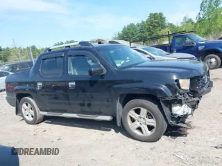 2010 Honda Ridgeline RTL z VIN 5FPYK1F56AB003730, wystawiony jako IAAI lot #42255351 z przebiegiem 190 630 mil mil oraz . Historia ofert i sprzedaży dostępna na DreamBid. Obrazek 13.