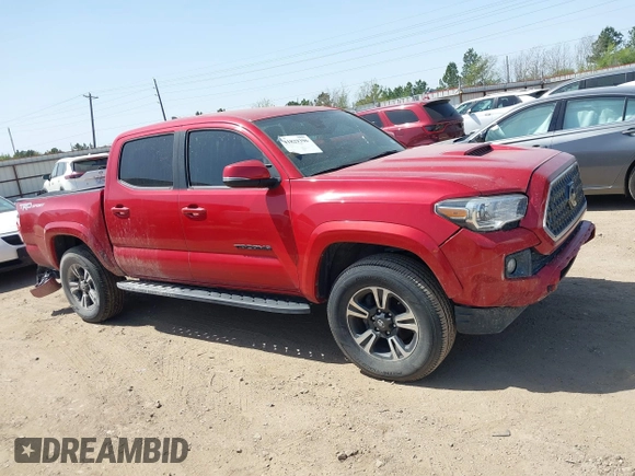 2018 Toyota Tacoma SR5 with VIN 5TFAZ5CN0JX063350, listed as a IAAI auction lot 41829396 with 61,155 mi miles and . Bid and sale history available at DreamBid. Image 14.