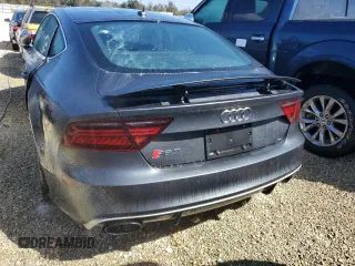 2016 Audi RS 7 Prestige z VIN WUAW2AFC2GN900328, wystawiony jako Copart lot #74450074 z przebiegiem Nie podano mil oraz Nie do naprawy. Historia ofert i sprzedaży dostępna na DreamBid. Obrazek 6.