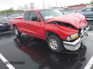 1999 Dodge Dakota SLT z VIN 1B7GL22X3XS155894, wystawiony jako IAAI lot #41938830 z przebiegiem 224 068 mil mil oraz . Historia ofert i sprzedaży dostępna na DreamBid. Obrazek 1.