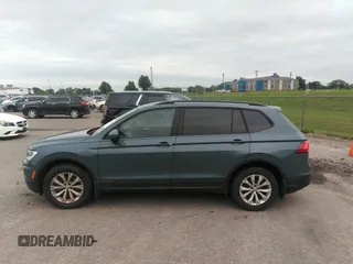 2019 Volkswagen Tiguan S z VIN 3VV1B7AXXKM121963, wystawiony jako IAAI lot #40076115 z przebiegiem 167 540 mil mil oraz . Historia ofert i sprzedaży dostępna na DreamBid. Obrazek 13.