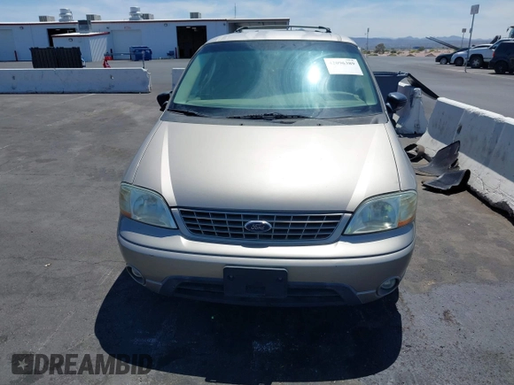 2003 Ford Windstar LX with VIN 2FMZA51493BA07188, listed as a IAAI auction lot 42096389 with 119,039 mi miles and . Bid and sale history available at carsss.com. Image 6.