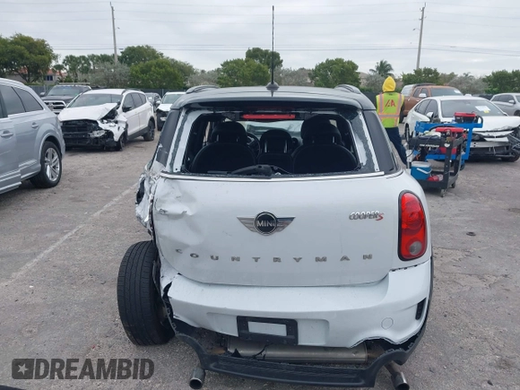 2015 MINI Countryman S z VIN WMWZC3C5XFWP53190, wystawiony jako IAAI lot #41273123 z przebiegiem 163 658 mil mil oraz . Historia ofert i sprzedaży dostępna na DreamBid. Obrazek 16.