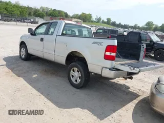 2005 Ford F-150 STX with VIN 1FTRX14W55FA69973, listed as a IAAI auction lot 42080948 with 250,000 mi miles and . Bid and sale history available at carsss.com. Image 3.