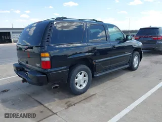 2004 GMC Yukon Denali with VIN 1GKEK63U54J308934, listed as a IAAI auction lot 42124676 with 254,362 mi miles. Bid and sale history available at carsss.com. Image 4.