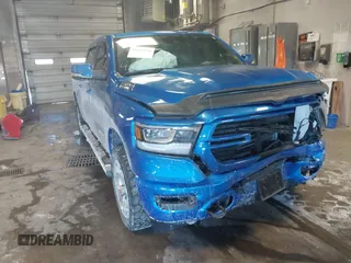 2021 Ram 1500 Big Horn z VIN 1C6SRFMT7MN516975, wystawiony jako IAAI lot #41631210 z przebiegiem 59 214 mil mil oraz . Historia ofert i sprzedaży dostępna na DreamBid. Obrazek 1.