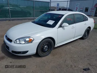 2015 Chevrolet Impala Limited Police Police with VIN 2G1WD5E35F1165983, listed as a IAAI auction lot 41969158 with 137,779 mi miles. Bid and sale history available at carsss.com. Image 2.