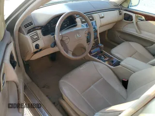 2000 Mercedes-Benz E-Class with VIN WDBJH65J4YB071699, listed as a Copart auction lot 75082144 with 105,989 mi miles and Salvage Title. Bid and sale history available at carsss.com. Image 8.
