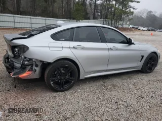 2015 BMW 4 Series 428i xDrive with VIN WBA4C9C54FG135273, listed as a Copart auction lot 48623135 with 202,238 mi miles and Salvage Title. Bid and sale history available at DreamBid. Image 3.