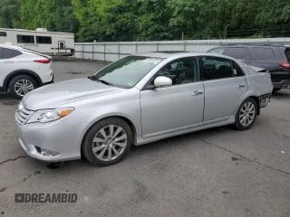 2012 Toyota Avalon with VIN 4T1BK3DBXCU470349, listed as a Copart auction lot 61353625 with 69,404 mi miles and Salvage title. Bid and sale history available at DreamBid. Image 1.